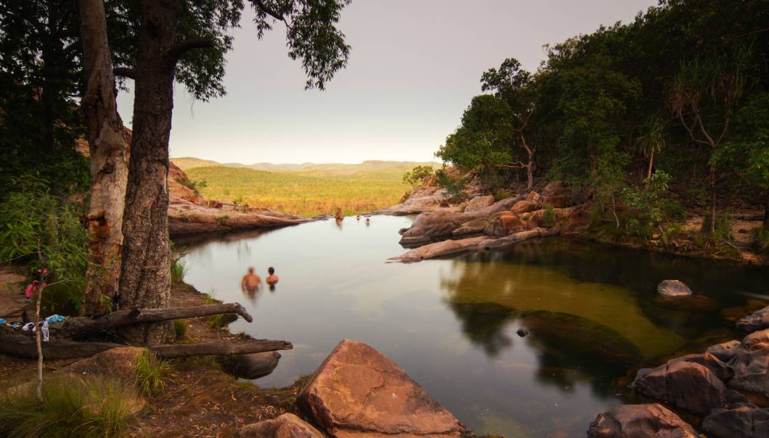 Relaxing in the waterhole above Gunlom Waterfall on the Kakadu Walking Adventure |  <i>Rhys Clarke</i>