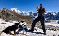 A happy trekker on the Karakachu La (5020m) pass in Bhutan |  Matt Brazier