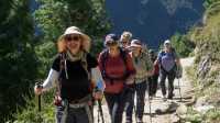 Women hikers sharing the trail in the Nepal Himalaya |  Sherry Ott