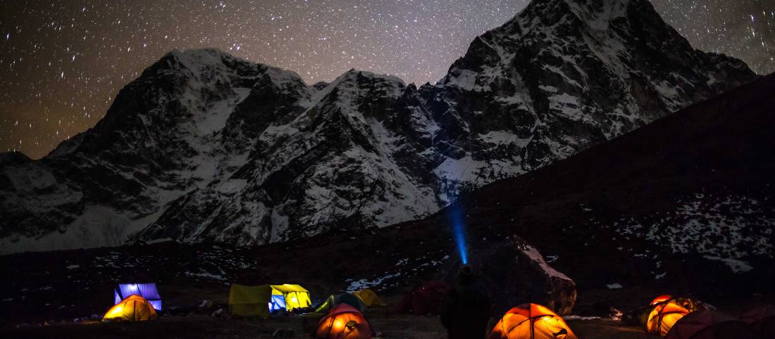 Base camp on Lobuche East with Cholatse towering above |  <i>Tina Lacey</i>