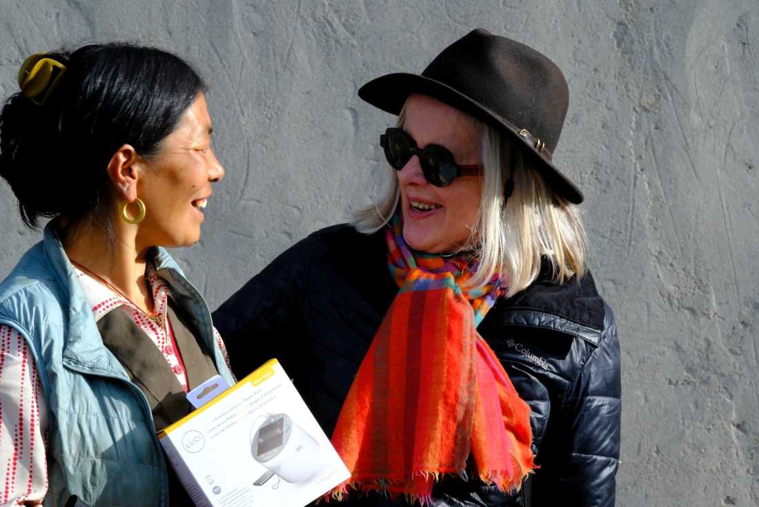Margie Thomas delivering solar lamps, courtesy of Paddy Pallin, in Mustang